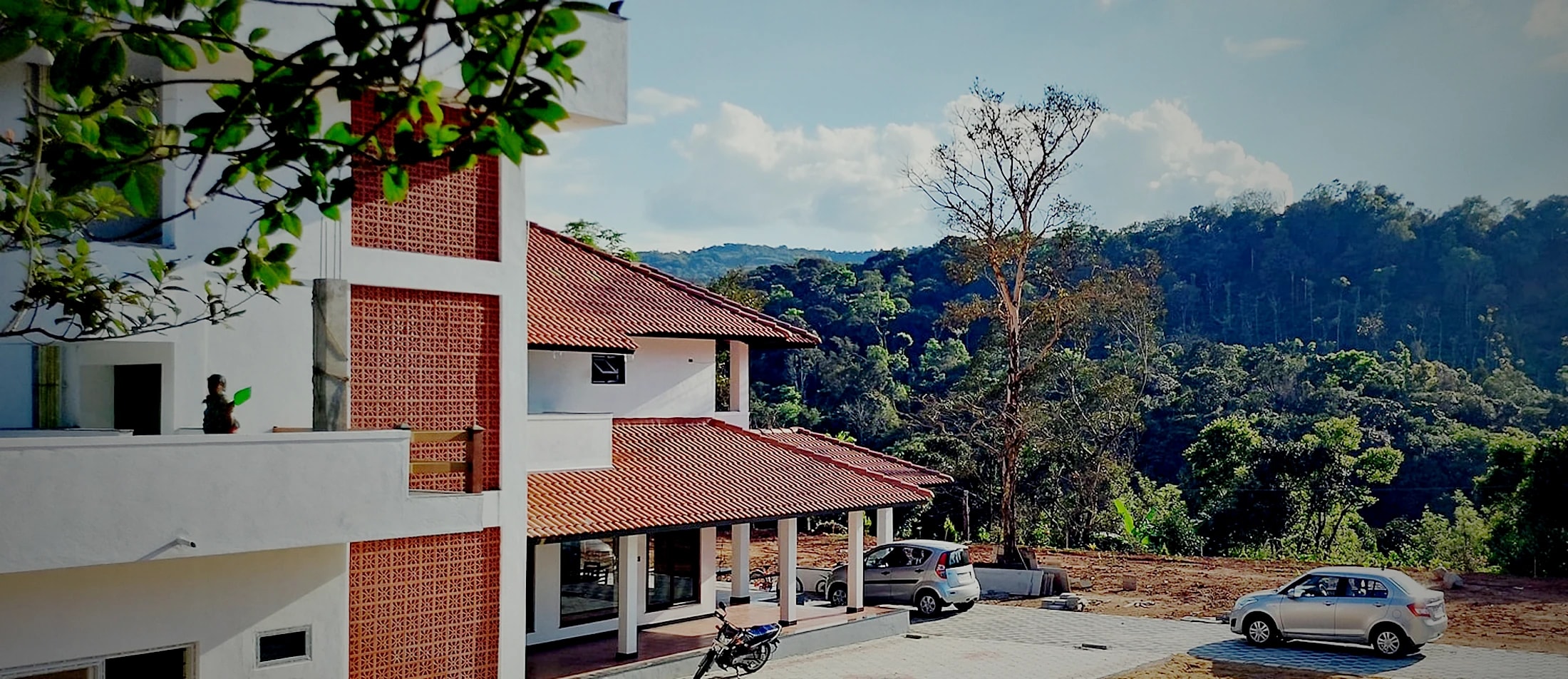 The homestay and the valley beyond it, late in the day
