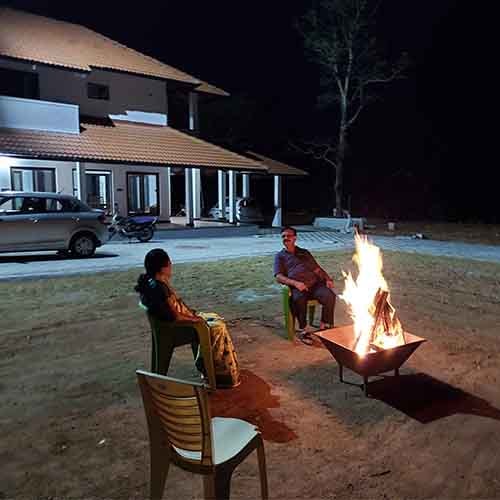 Guests gathered around the bonfire